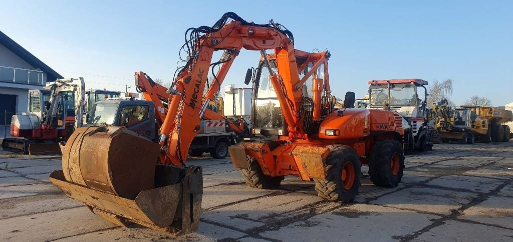 Mecalac 12 M TX - מחפר גלגלים: תמונה 1 Mecalac 12 M TX - מחפר גלגלים: תמונה 1