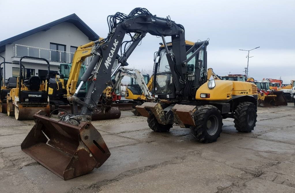 Mecalac 12 M TX - מחפר גלגלים: תמונה 1 Mecalac 12 M TX - מחפר גלגלים: תמונה 1