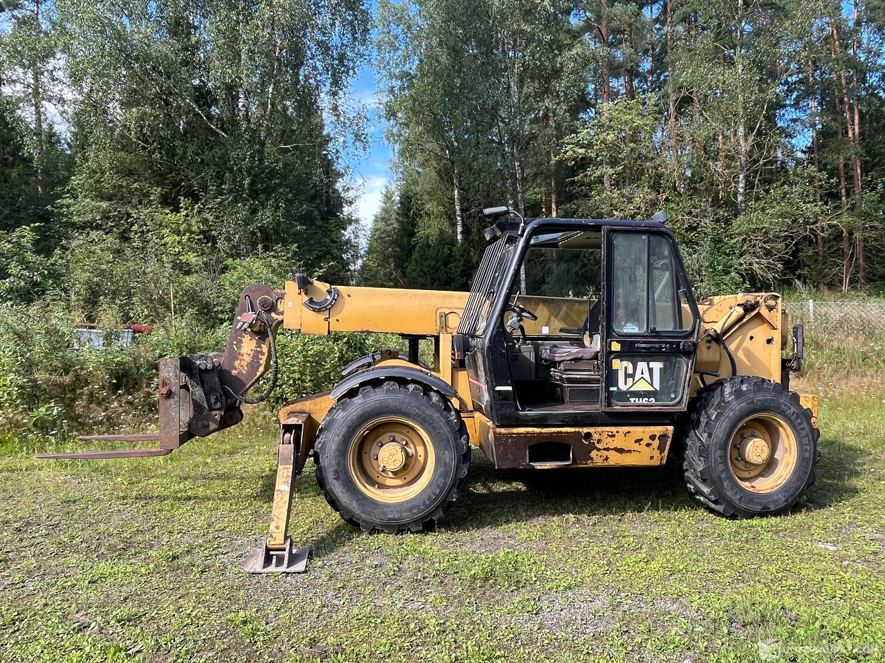 Caterpillar TH63, kurottaja piikeillä ja kauhalla, 2002, Loppi - מכונה חקלאית: תמונה 2 Caterpillar TH63, kurottaja piikeillä ja kauhalla, 2002, Loppi - מכונה חקלאית: תמונה 2