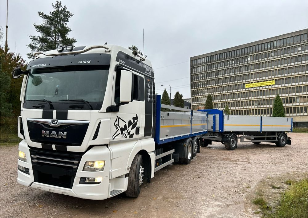 MAN TGX Tandem 1m burty TOP KOMPLET / ALUFELGI / zarejestrowany gotowy do pracy / przyczepa 18t / FULL OPCJA / 26.420 26.460 26.500 26.400 26.440 26.480 26.510 460 500 - משאית צד נופל/ שטוחה: תמונה 1 MAN TGX Tandem 1m burty TOP KOMPLET / ALUFELGI / zarejestrowany gotowy do pracy / przyczepa 18t / FULL OPCJA / 26.420 26.460 26.500 26.400 26.440 26.480 26.510 460 500 - משאית צד נופל/ שטוחה: תמונה 1