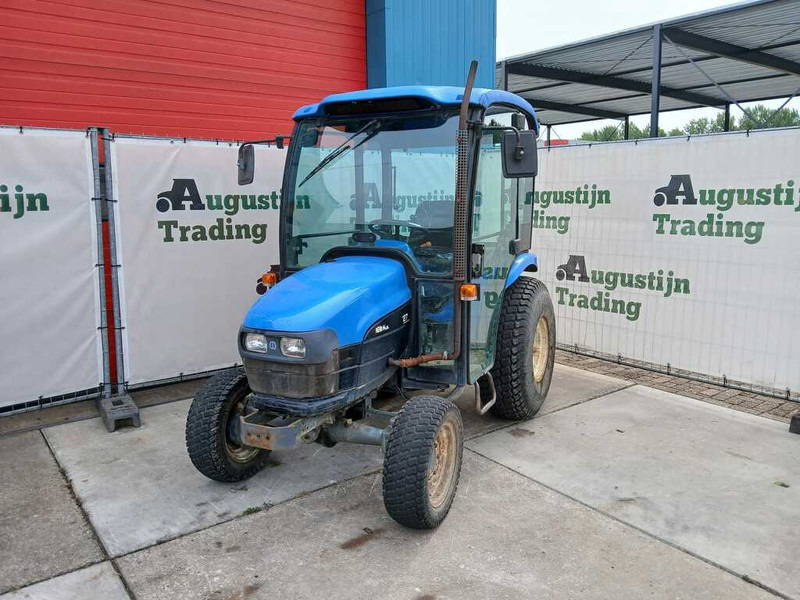 New Holland TC 27 - טרקטור קומפקטי: תמונה 1 New Holland TC 27 - טרקטור קומפקטי: תמונה 1