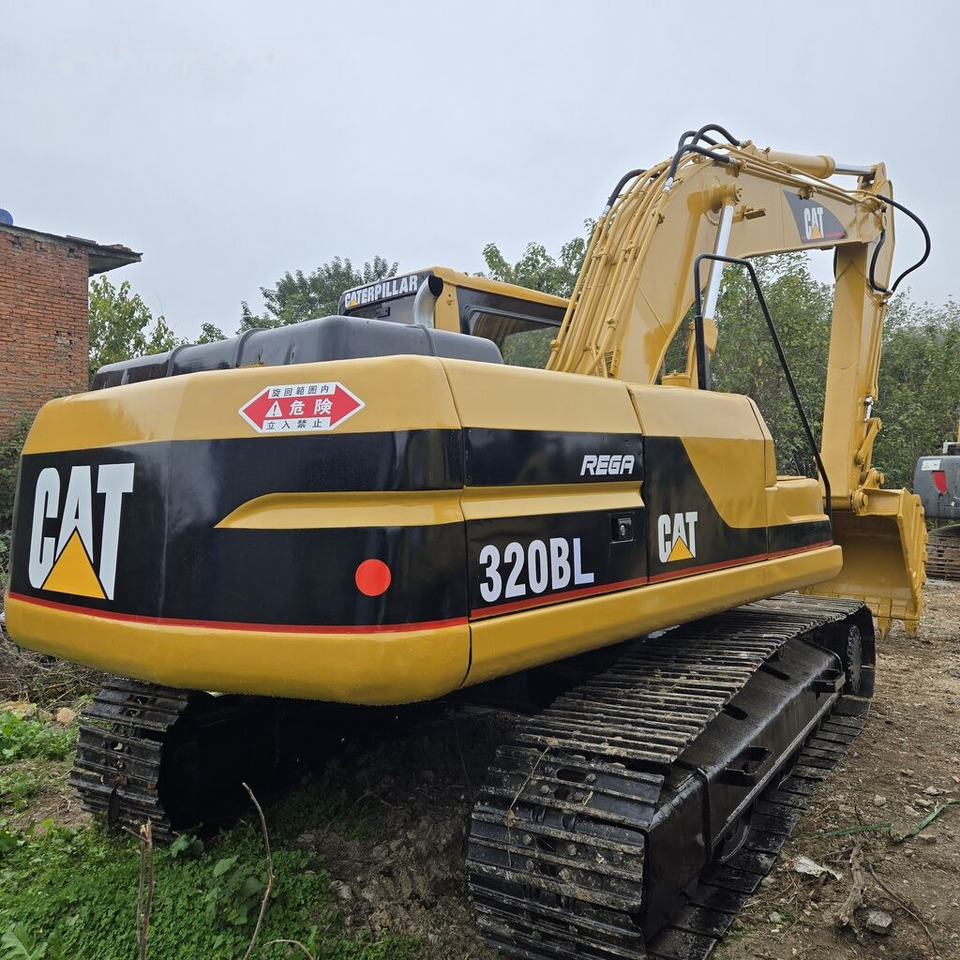 מחפר סורק Caterpillar 320BL: תמונה 8