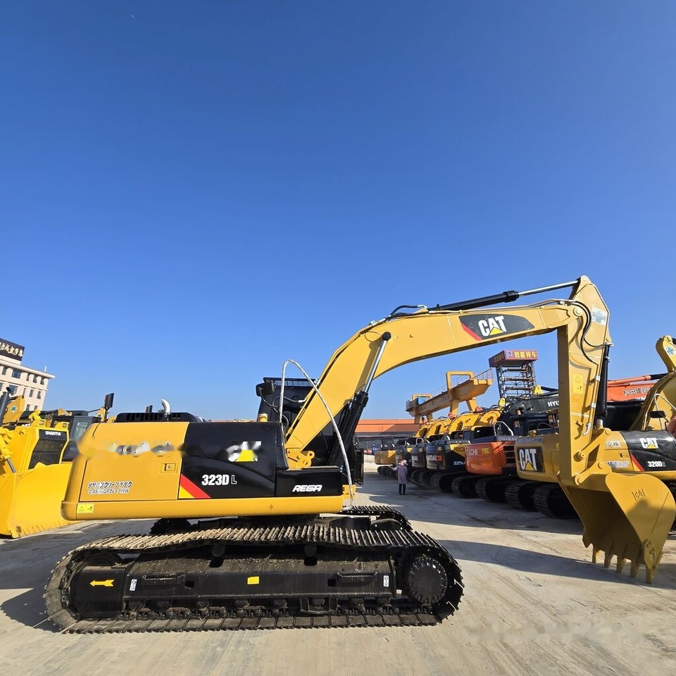 Caterpillar 323DL - מחפר סורק: תמונה 1 Caterpillar 323DL - מחפר סורק: תמונה 1