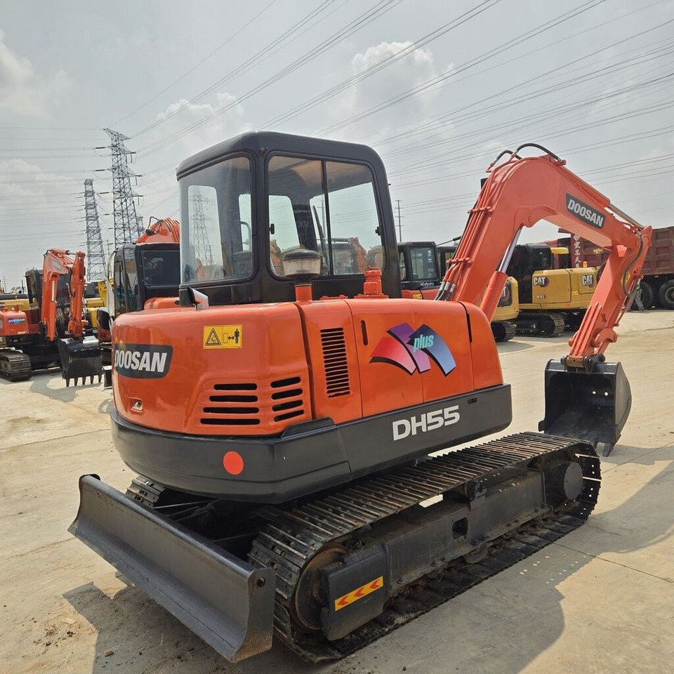 Doosan DH55 - מיני מחפר: תמונה 1 Doosan DH55 - מיני מחפר: תמונה 1