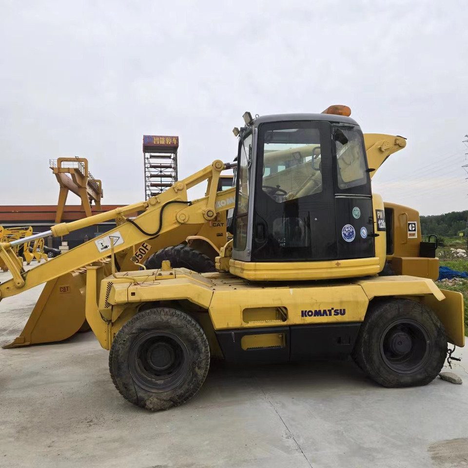 KOMATSU PC128US - מחפר גלגלים: תמונה 2 KOMATSU PC128US - מחפר גלגלים: תמונה 2