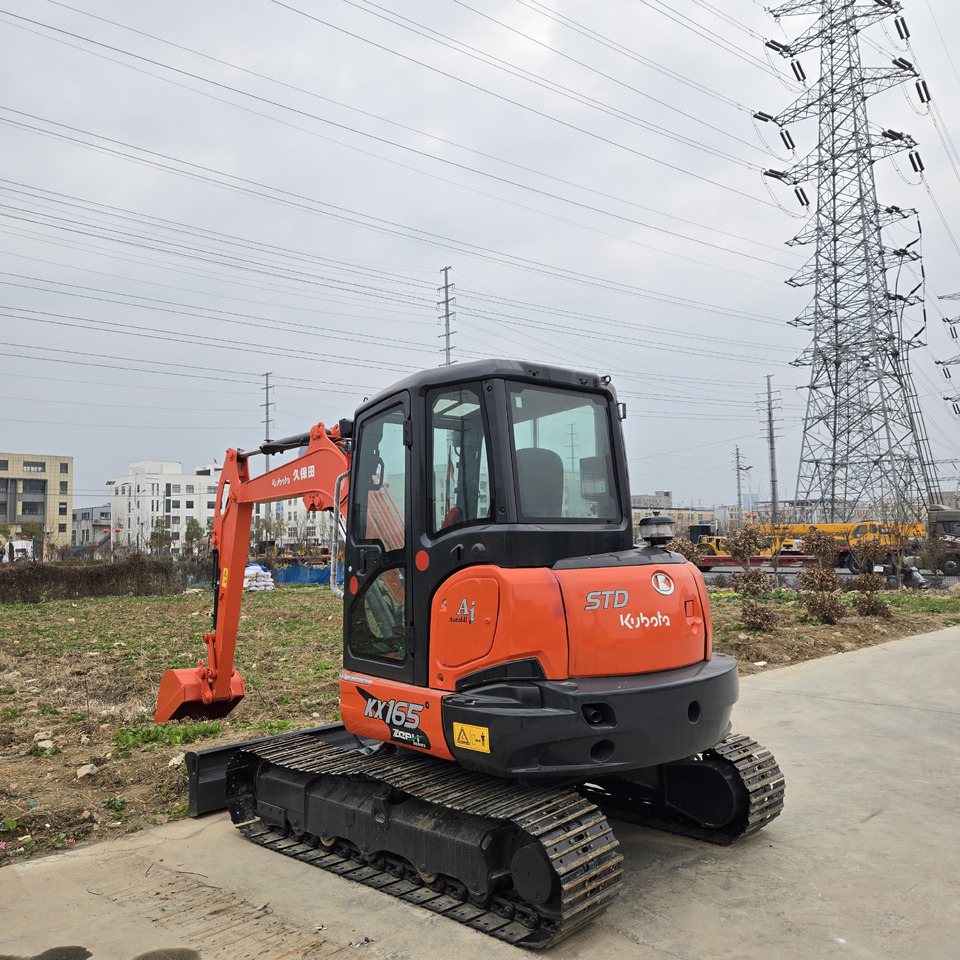 Kubota KX165 - מיני מחפר: תמונה 1 Kubota KX165 - מיני מחפר: תמונה 1