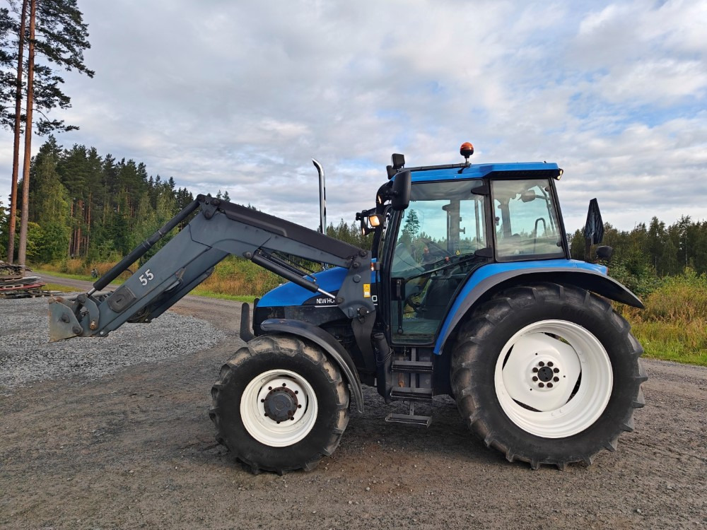New Holland TS100, ES vaihteisto, ilmastointi, etukuormaaja Ålö Q55, katso video! - טרקטור חקלאי: תמונה 2 New Holland TS100, ES vaihteisto, ilmastointi, etukuormaaja Ålö Q55, katso video! - טרקטור חקלאי: תמונה 2