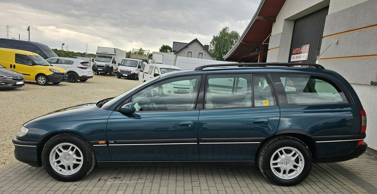 Opel Omega B 2,5 v6 *automat* napęd tył *welury* - מכונית: תמונה 4 Opel Omega B 2,5 v6 *automat* napęd tył *welury* - מכונית: תמונה 4