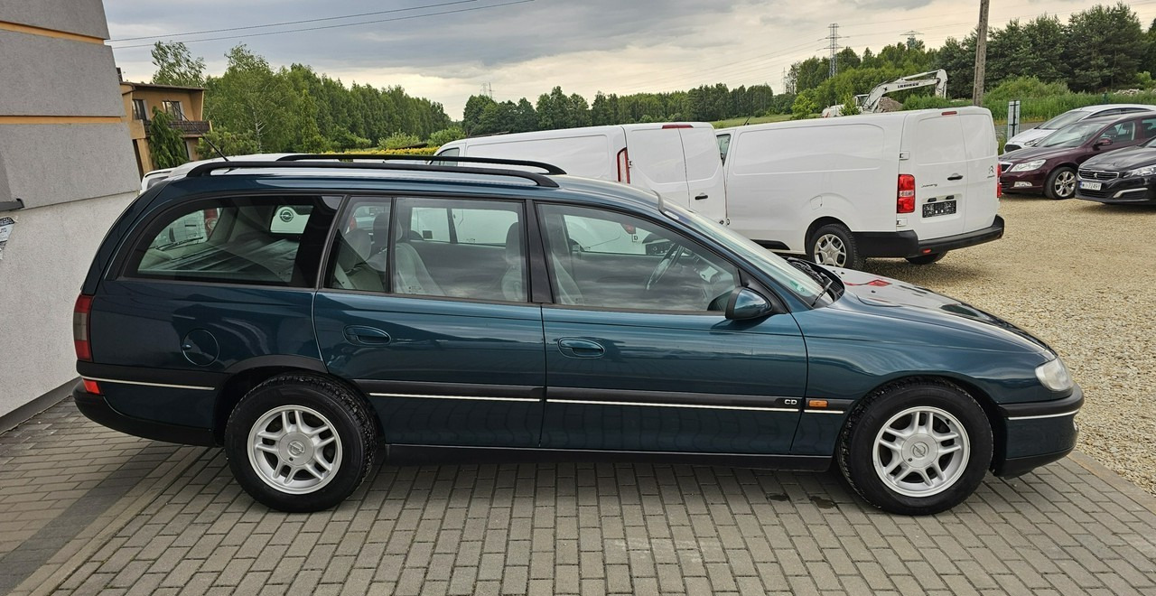 Opel Omega B 2,5 v6 *automat* napęd tył *welury* - מכונית: תמונה 5 Opel Omega B 2,5 v6 *automat* napęd tył *welury* - מכונית: תמונה 5
