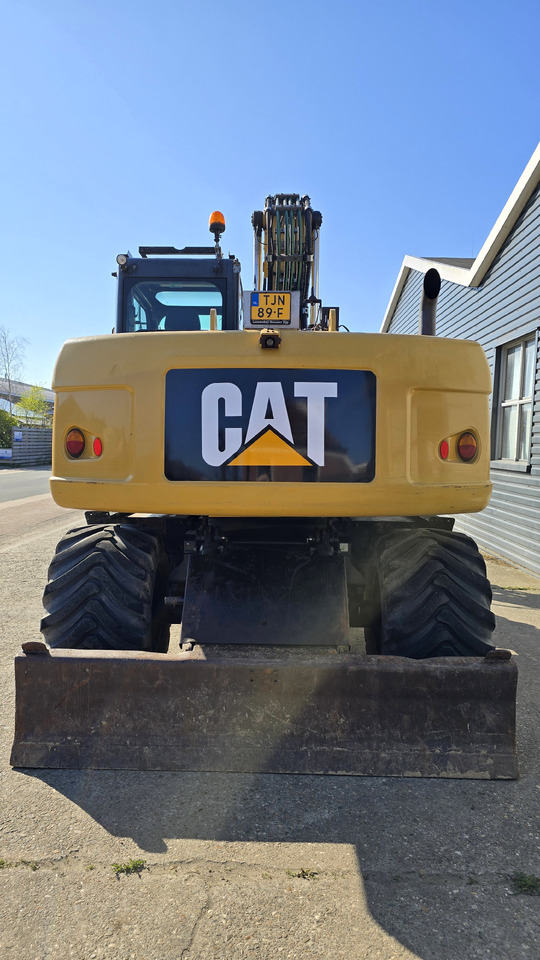 מחפר גלגלים CATERPILLAR M313D: תמונה 18