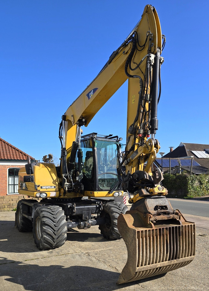 CATERPILLAR M313D - מחפר גלגלים: תמונה 3 CATERPILLAR M313D - מחפר גלגלים: תמונה 3