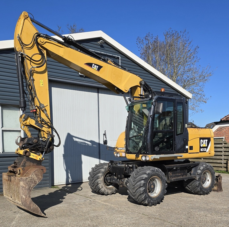 CATERPILLAR M313D - מחפר גלגלים: תמונה 2 CATERPILLAR M313D - מחפר גלגלים: תמונה 2