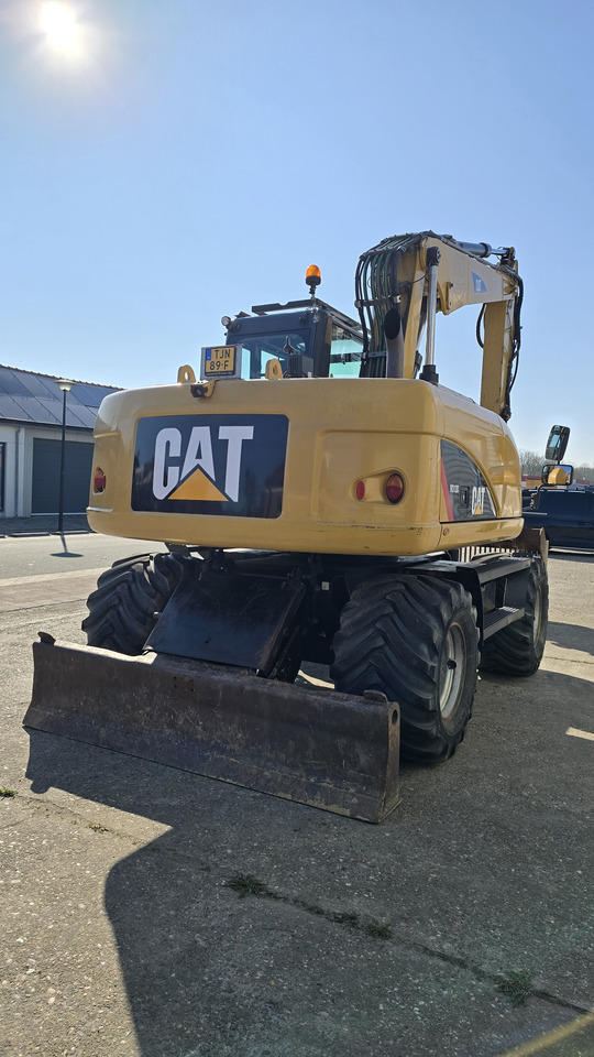 מחפר גלגלים CATERPILLAR M313D: תמונה 6