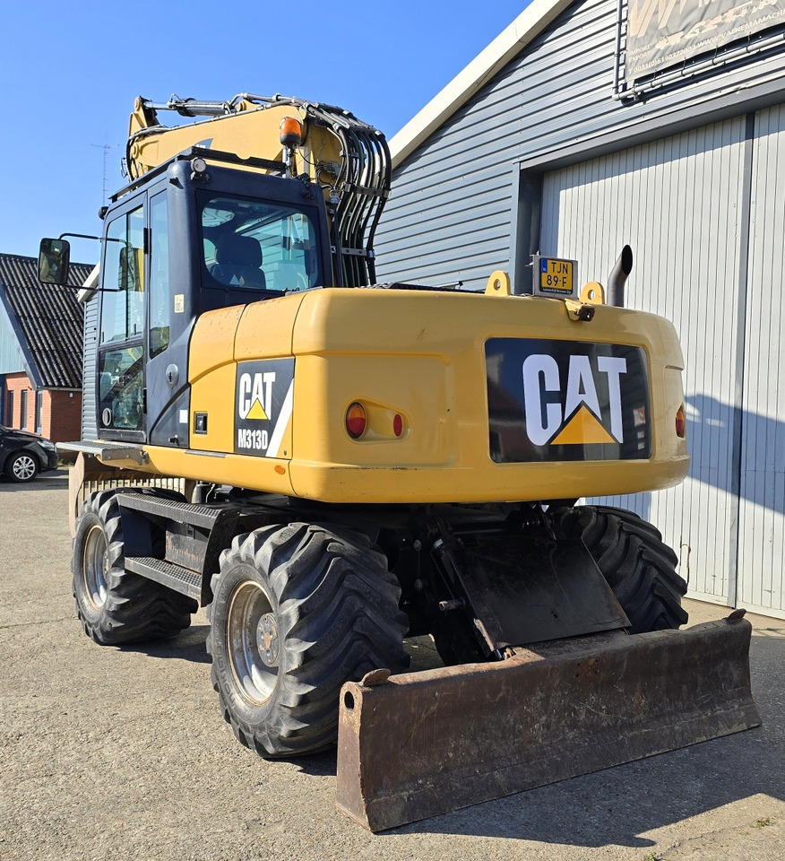 מחפר גלגלים CATERPILLAR M313D: תמונה 7