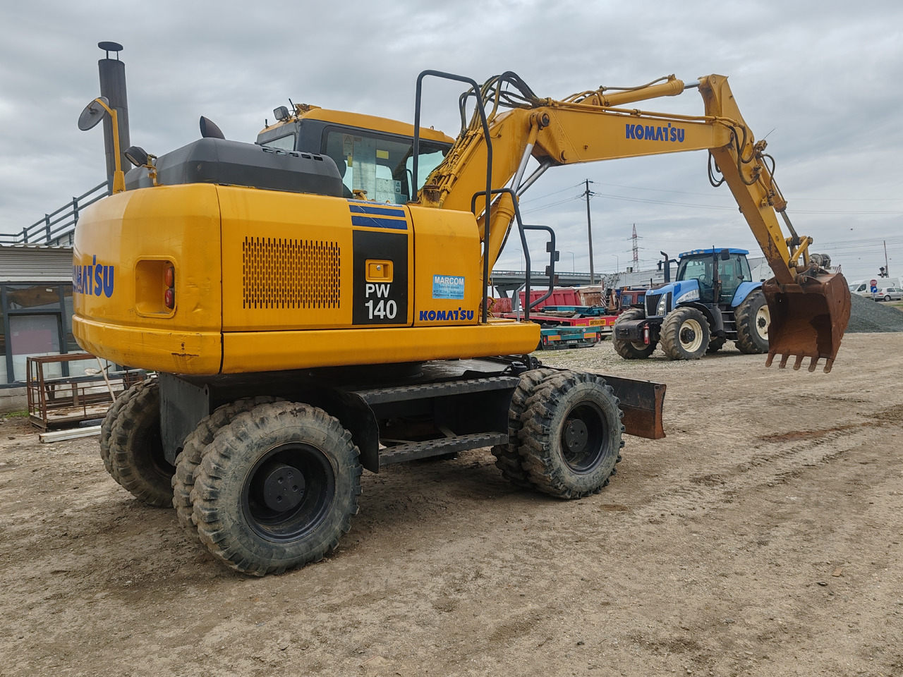 Komatsu PW140-7 - מחפר גלגלים: תמונה 3 Komatsu PW140-7 - מחפר גלגלים: תמונה 3