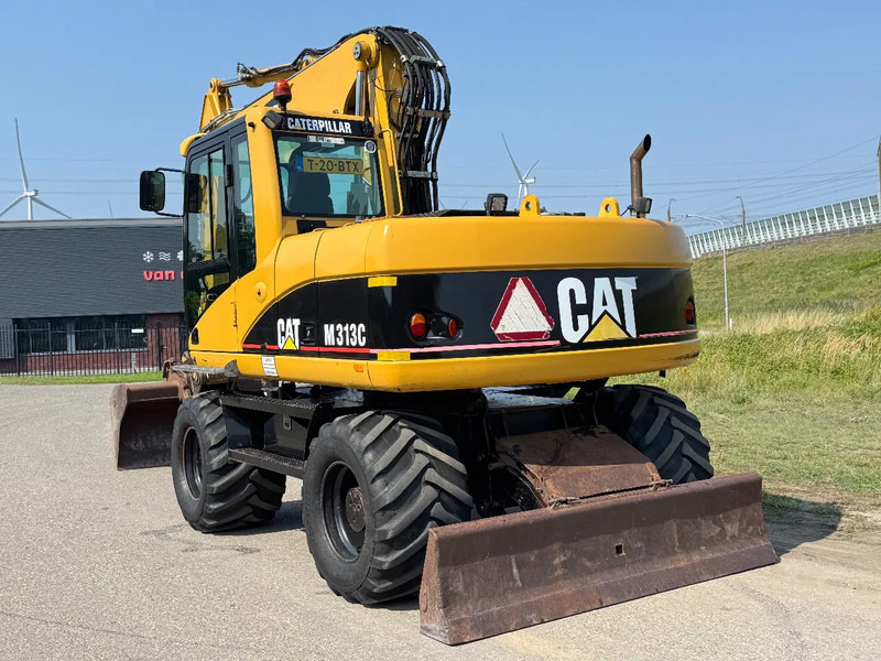 Caterpillar M313C - מחפר גלגלים: תמונה 4 Caterpillar M313C - מחפר גלגלים: תמונה 4