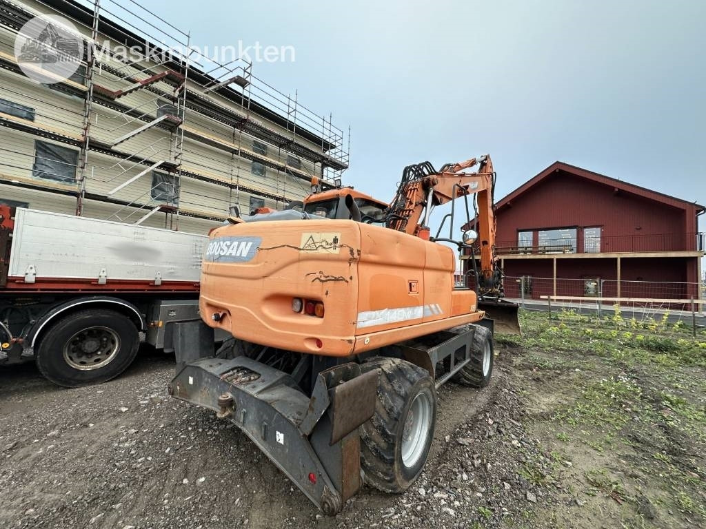 Doosan DX 140 W med vagn och redskap - מחפר גלגלים: תמונה 4 Doosan DX 140 W med vagn och redskap - מחפר גלגלים: תמונה 4