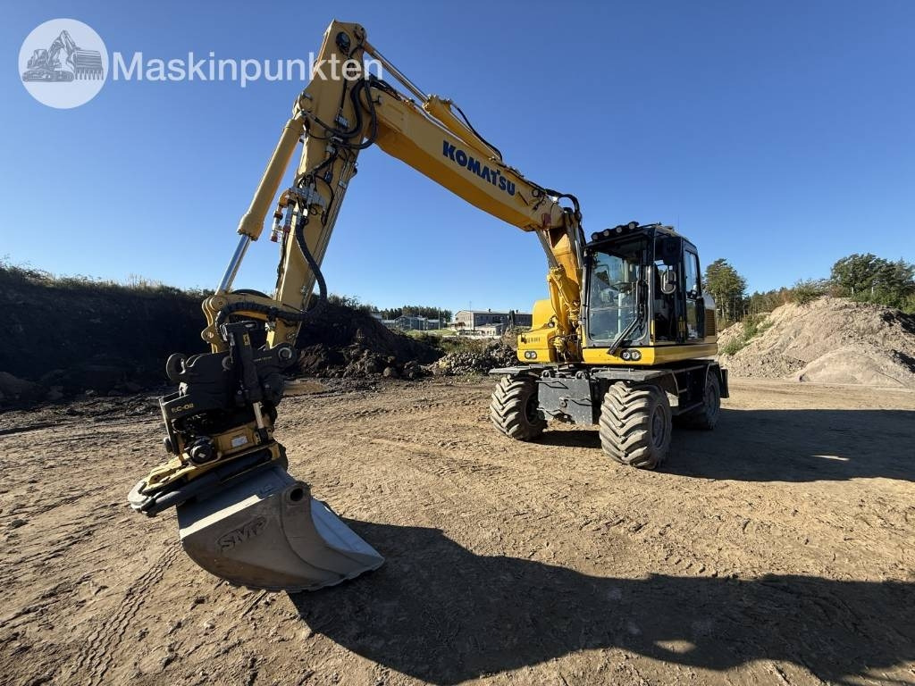 Komatsu PW 160 - מחפר גלגלים: תמונה 1 Komatsu PW 160 - מחפר גלגלים: תמונה 1