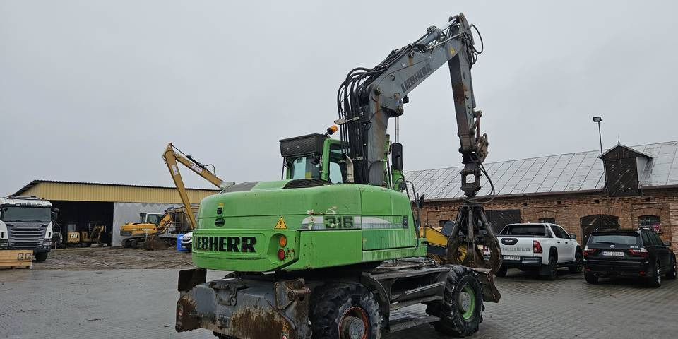 Koparka kołowa Liebherr A 316 Litronic chwytak podpory pług - מחפר גלגלים: תמונה 5 Koparka kołowa Liebherr A 316 Litronic chwytak podpory pług - מחפר גלגלים: תמונה 5