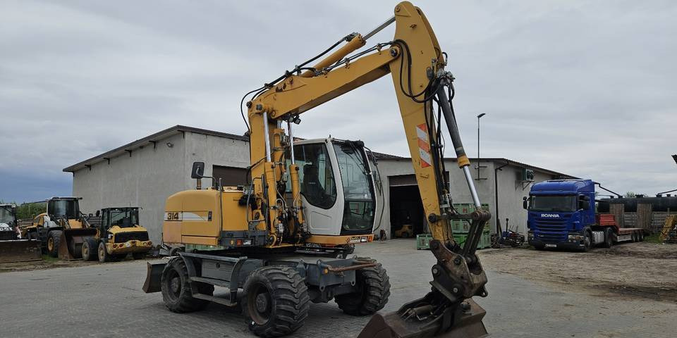Koparka kołowa Liebherr A314 Litronic 9350 h 4 łyżki kołówka - מחפר גלגלים: תמונה 4 Koparka kołowa Liebherr A314 Litronic 9350 h 4 łyżki kołówka - מחפר גלגלים: תמונה 4