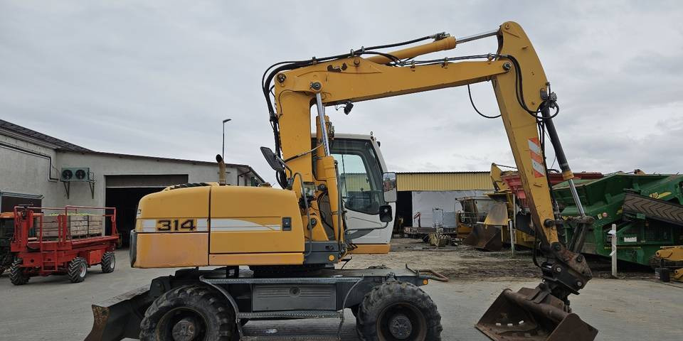 Koparka kołowa Liebherr A314 Litronic 9350 h 4 łyżki kołówka - מחפר גלגלים: תמונה 5 Koparka kołowa Liebherr A314 Litronic 9350 h 4 łyżki kołówka - מחפר גלגלים: תמונה 5