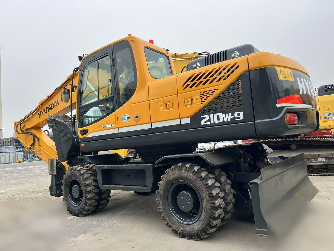 HYUNDAI ROBEX 210W-9S - מחפר גלגלים: תמונה 1 HYUNDAI ROBEX 210W-9S - מחפר גלגלים: תמונה 1