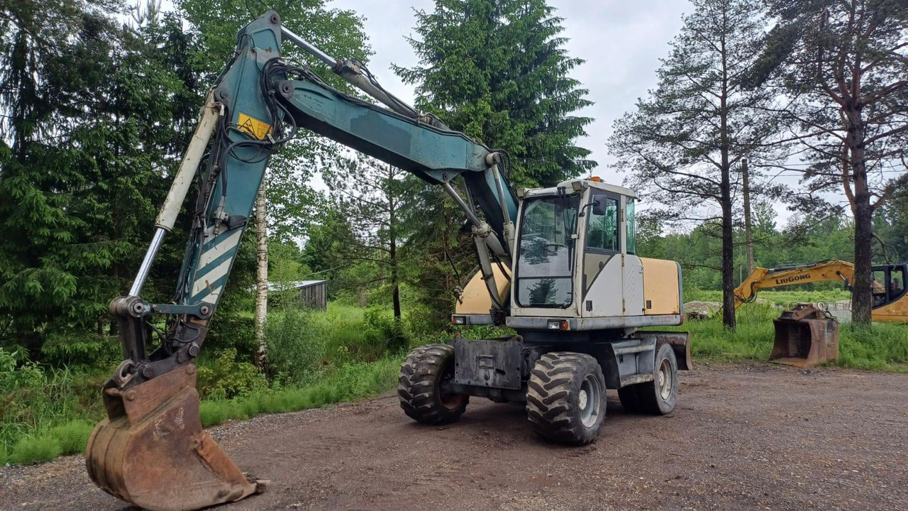 Volvo EW140 - מחפר גלגלים: תמונה 1 Volvo EW140 - מחפר גלגלים: תמונה 1
