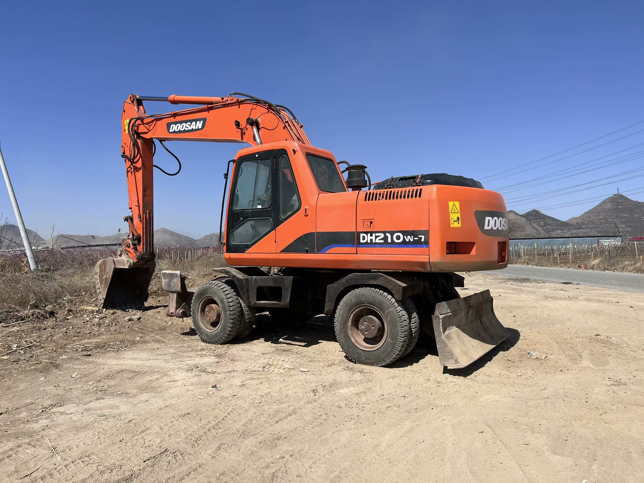 DOOSAN 210w-7 - מחפר גלגלים: תמונה 1 DOOSAN 210w-7 - מחפר גלגלים: תמונה 1