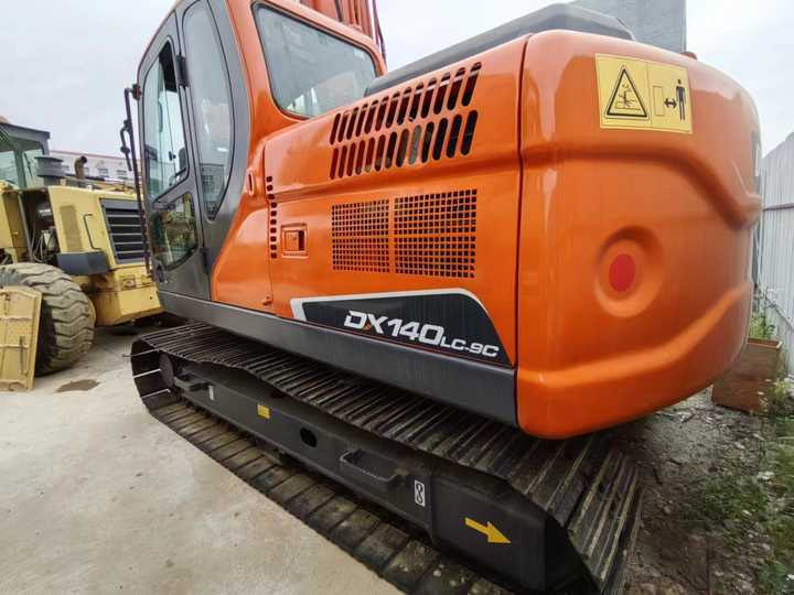 Used Digger DOOSAN DX140 Construction Machinery Construction Digger Used DOOSAN DX140 Cheap Excavator - מחפר סורק: תמונה 4 Used Digger DOOSAN DX140 Construction Machinery Construction Digger Used DOOSAN DX140 Cheap Excavator - מחפר סורק: תמונה 4