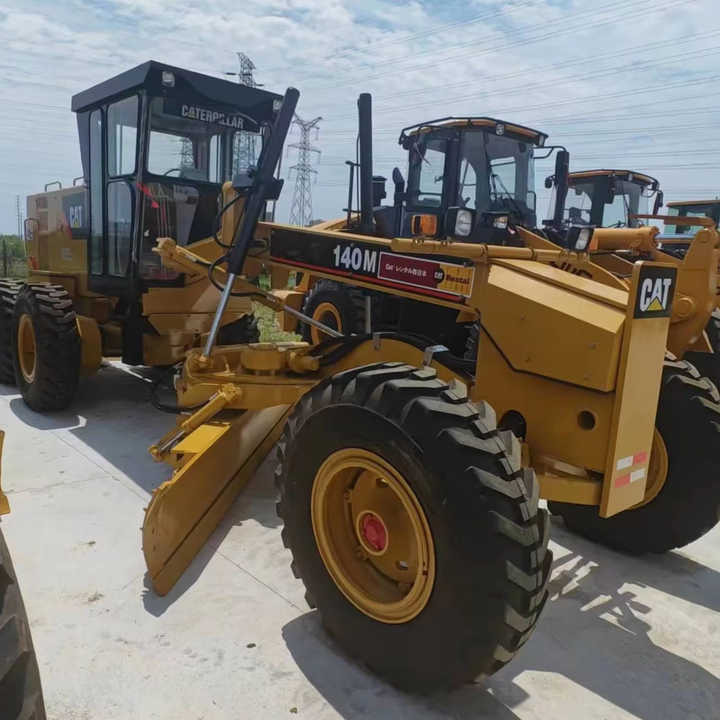 Used Japan Imported Caterpillar 140M Cat 140m Motor Grader with Good Quality and Low Price for Sale - מחפר: תמונה 1 Used Japan Imported Caterpillar 140M Cat 140m Motor Grader with Good Quality and Low Price for Sale - מחפר: תמונה 1