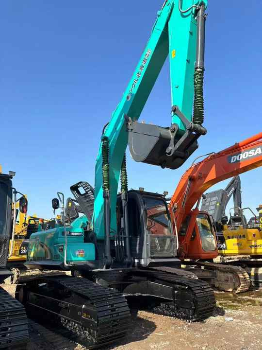 New Arrival Kobelco Sk200D 20tons Crawler Excavator for Sale 90% Brand New Kobelco Sk140 200 350 Digger in Stock - מחפר סורק: תמונה 2 New Arrival Kobelco Sk200D 20tons Crawler Excavator for Sale 90% Brand New Kobelco Sk140 200 350 Digger in Stock - מחפר סורק: תמונה 2