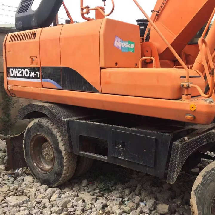 Used Digger Doosan Dh210w-7 Construction Machinery Construction Digger Used Doosan Dh210w-7 Cheap Excavator - מחפר גלגלים: תמונה 2 Used Digger Doosan Dh210w-7 Construction Machinery Construction Digger Used Doosan Dh210w-7 Cheap Excavator - מחפר גלגלים: תמונה 2