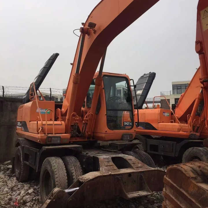 Used Digger Doosan Dh210w-7 Construction Machinery Construction Digger Used Doosan Dh210w-7 Cheap Excavator - מחפר גלגלים: תמונה 1 Used Digger Doosan Dh210w-7 Construction Machinery Construction Digger Used Doosan Dh210w-7 Cheap Excavator - מחפר גלגלים: תמונה 1