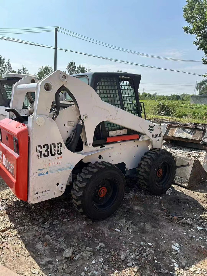 High Quality Mini Construction Machine Used Bobcat Skid Steer Loader S300 in Stock for Sale Bobcat Loader With Low Price - מעמיס היגוי החלקה: תמונה 2 High Quality Mini Construction Machine Used Bobcat Skid Steer Loader S300 in Stock for Sale Bobcat Loader With Low Price - מעמיס היגוי החלקה: תמונה 2