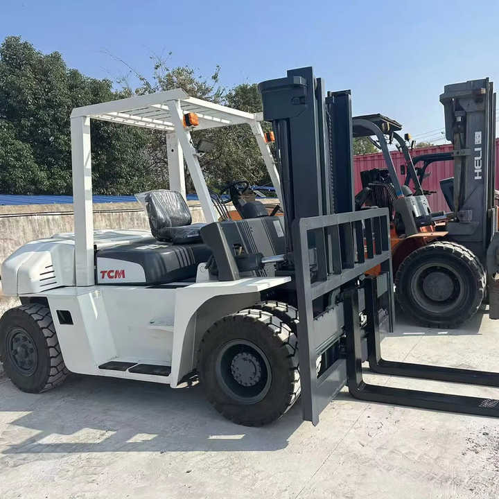 High Quality TCM 7 Ton with Hydraulic Distance Adjustment Used Forklift in Stock Used tcm Forklift 7 Ton Used tcm Fd70 Forklift - מלגזה: תמונה 1 High Quality TCM 7 Ton with Hydraulic Distance Adjustment Used Forklift in Stock Used tcm Forklift 7 Ton Used tcm Fd70 Forklift - מלגזה: תמונה 1