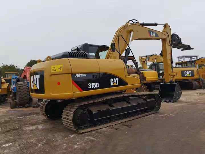 Used Digger Cat 315d Construction Machinery Construction Digger Used Cat 315d Cheap Excavator - מחפר סורק: תמונה 3 Used Digger Cat 315d Construction Machinery Construction Digger Used Cat 315d Cheap Excavator - מחפר סורק: תמונה 3