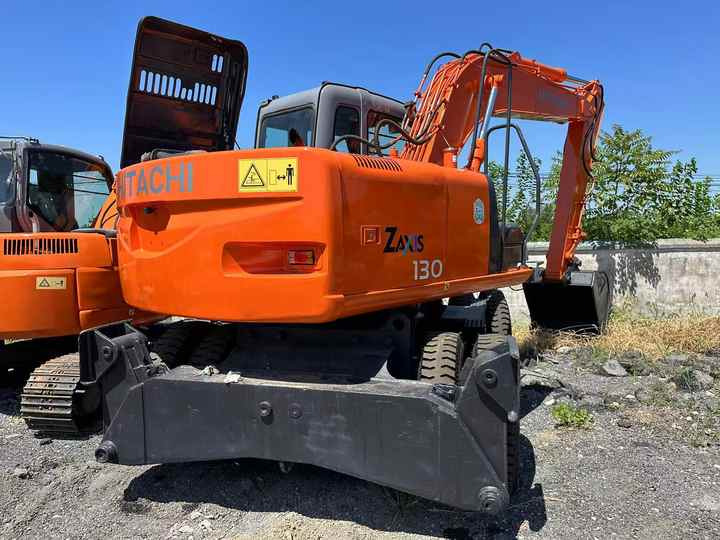 Used Wheel Excavator Hitachi ZX 130W Made in Japan 13ton Hitachi Zx130w Wheel Excavator Price Used Hitachi Zx130 Excavator SALE - מחפר: תמונה 2 Used Wheel Excavator Hitachi ZX 130W Made in Japan 13ton Hitachi Zx130w Wheel Excavator Price Used Hitachi Zx130 Excavator SALE - מחפר: תמונה 2