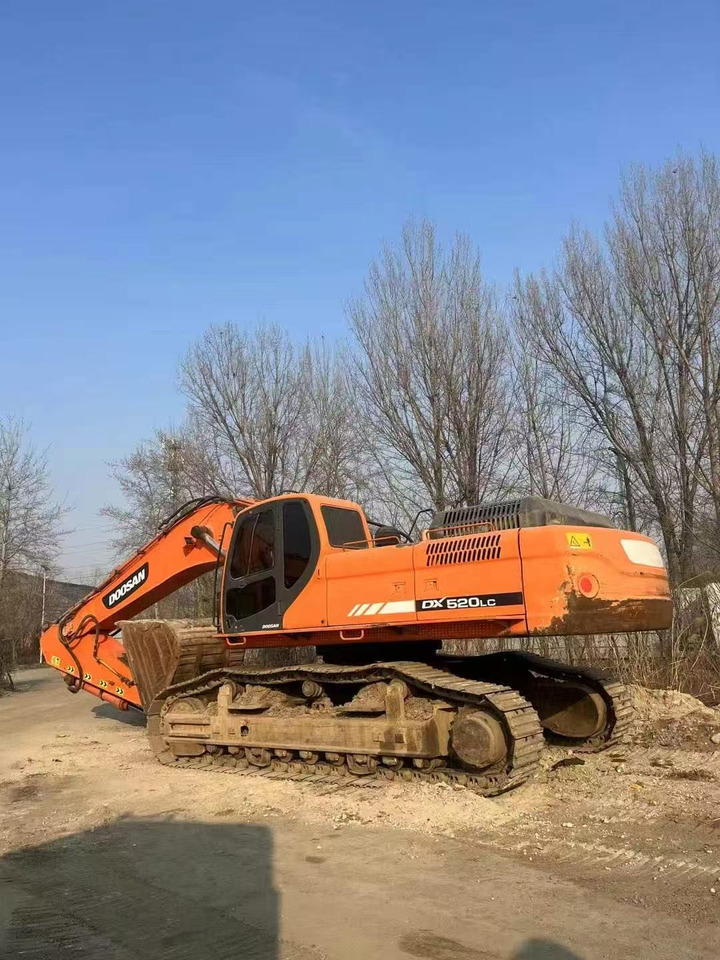 DOOSAN DX520LC-9C - מחפר סורק: תמונה 1 DOOSAN DX520LC-9C - מחפר סורק: תמונה 1