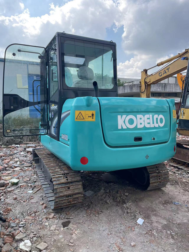 KOBELCO SK60 - מיני מחפר: תמונה 1 KOBELCO SK60 - מיני מחפר: תמונה 1