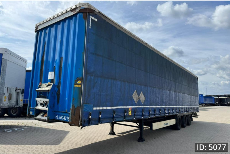 Krone SD / Mega / BPW Disk - סמיטריילר עם וילונות צד: תמונה 1 Krone SD / Mega / BPW Disk - סמיטריילר עם וילונות צד: תמונה 1
