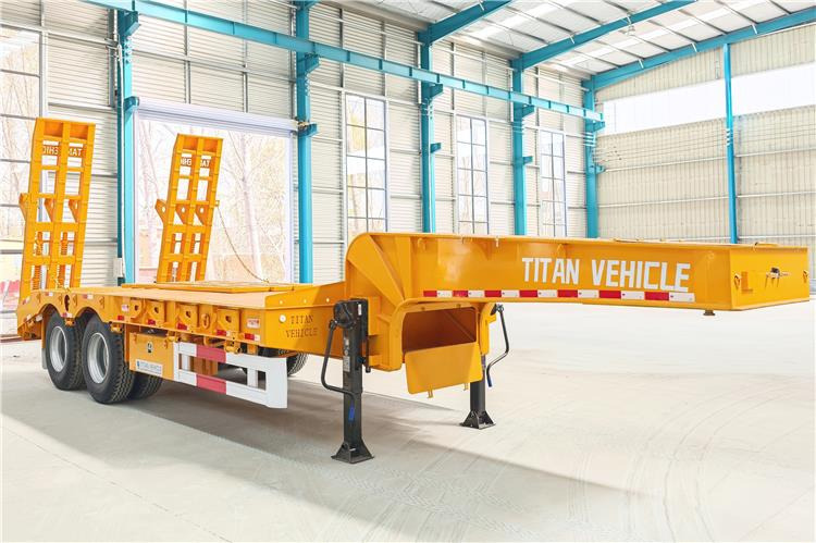 TITAN 2 Axle Low Loader Truck Trailer for Sale In Uganda - סמיטריילר עם מטען נמוך: תמונה 1 TITAN 2 Axle Low Loader Truck Trailer for Sale In Uganda - סמיטריילר עם מטען נמוך: תמונה 1