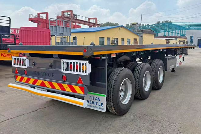 TITAN 3 Axle Flatbed Semi Trailer for Sale in Ghana - סמיטריילר צד נופל/ שטוח: תמונה 2 TITAN 3 Axle Flatbed Semi Trailer for Sale in Ghana - סמיטריילר צד נופל/ שטוח: תמונה 2