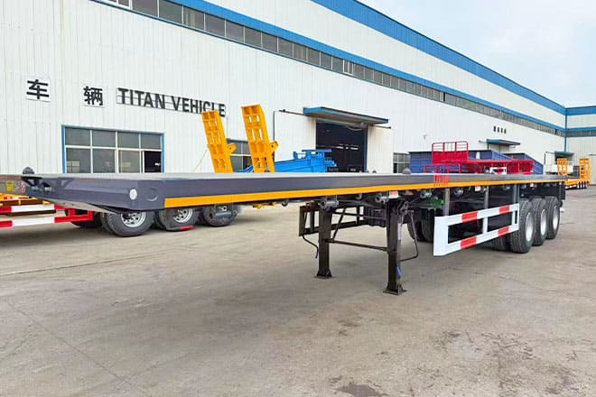 TITAN 3 Axle Flatbed Semi Trailer for Sale in Ghana - סמיטריילר צד נופל/ שטוח: תמונה 1 TITAN 3 Axle Flatbed Semi Trailer for Sale in Ghana - סמיטריילר צד נופל/ שטוח: תמונה 1