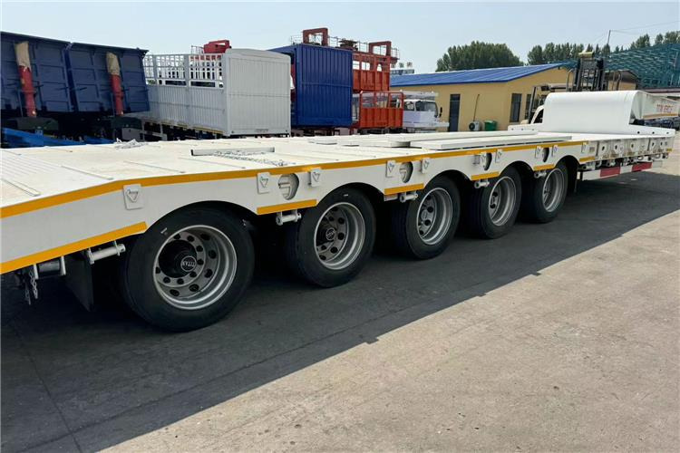 TITAN 5 Axle 100 Ton Low Bed Trailer for Sale In Tanzania - סמיטריילר עם מטען נמוך: תמונה 3 TITAN 5 Axle 100 Ton Low Bed Trailer for Sale In Tanzania - סמיטריילר עם מטען נמוך: תמונה 3