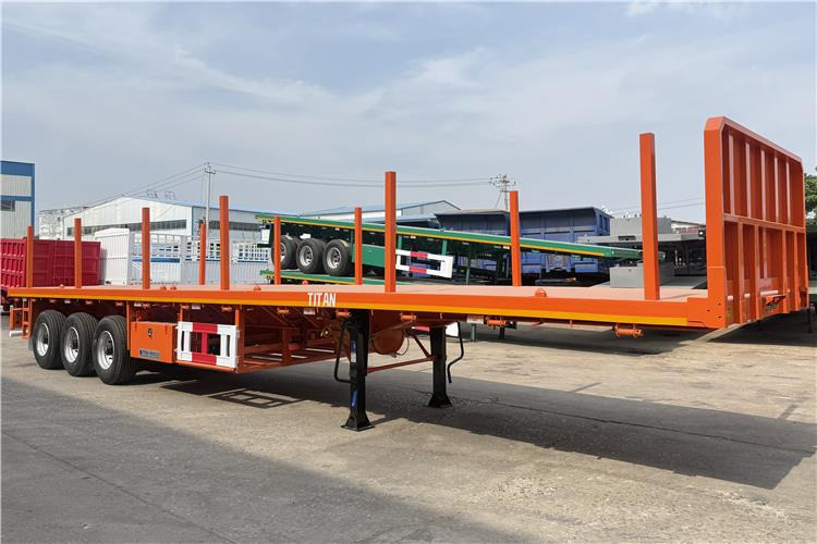 TITAN Container Flatbed Truck Trailer with Piles In Angola - סמיטריילר מוביל מכולות/ החלפת גוף: תמונה 1 TITAN Container Flatbed Truck Trailer with Piles In Angola - סמיטריילר מוביל מכולות/ החלפת גוף: תמונה 1