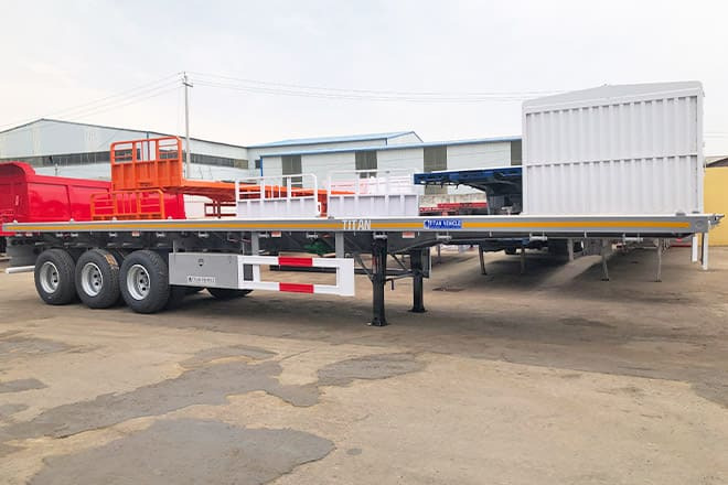 TITAN Tri Axle 40Ft Flatbed Trailer Price for Sale in Sierra Leone - סמיטריילר צד נופל/ שטוח: תמונה 5 TITAN Tri Axle 40Ft Flatbed Trailer Price for Sale in Sierra Leone - סמיטריילר צד נופל/ שטוח: תמונה 5
