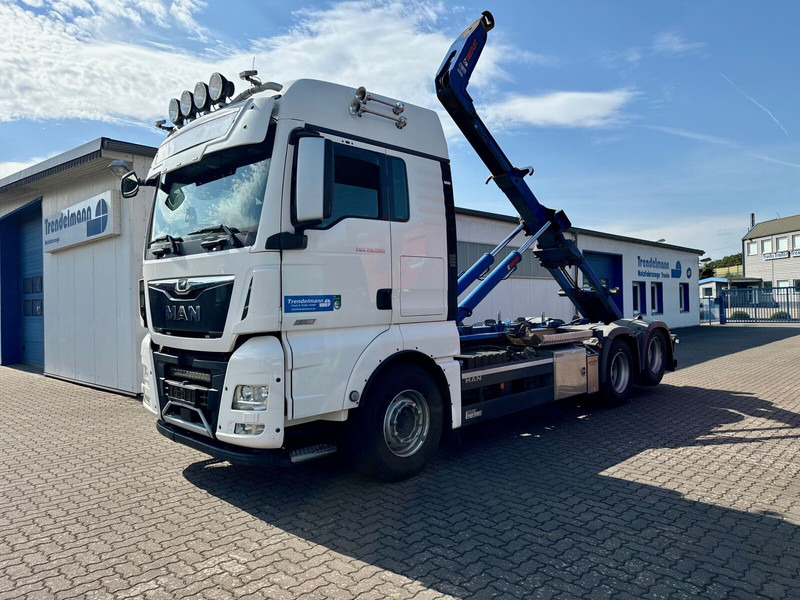 MAN TGX 26.580 BL 6x2 Zwillingbereifte Liftachse Abroller Hiab Funk- - משאית הרמת וו: תמונה 1 MAN TGX 26.580 BL 6x2 Zwillingbereifte Liftachse Abroller Hiab Funk- - משאית הרמת וו: תמונה 1