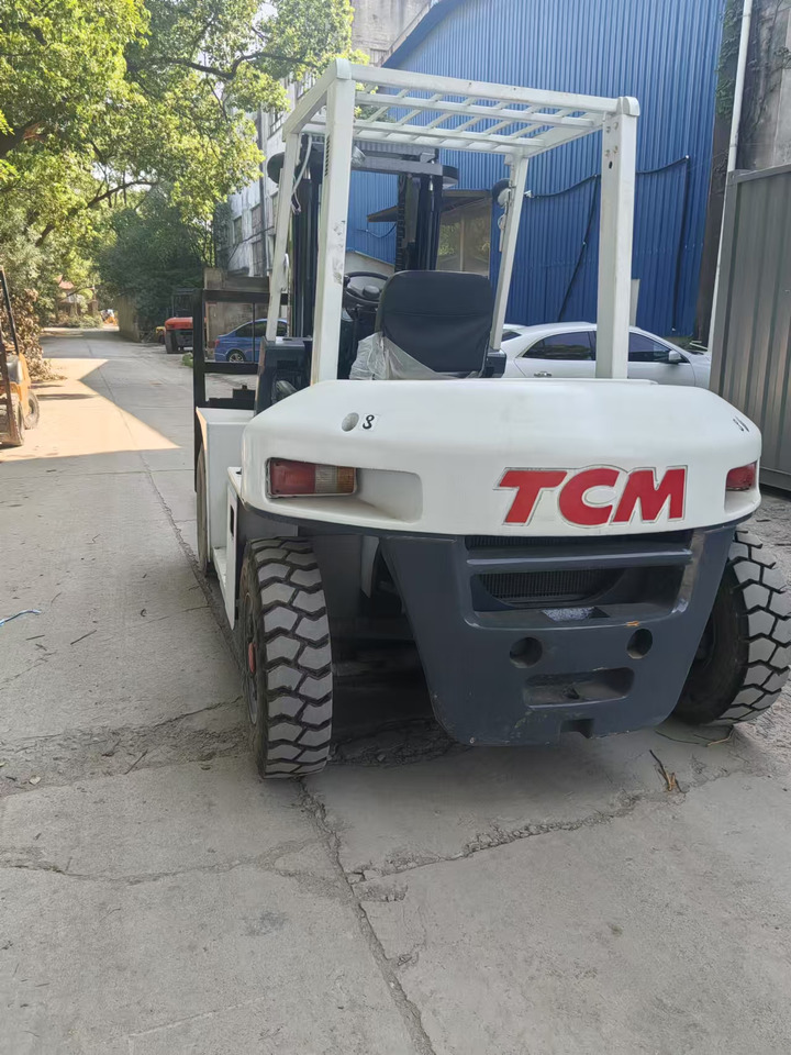 TCM FD50 Japan brand used 5 ton diesel forklift Customizable mast clamps - מלגזת סולר: תמונה 3 TCM FD50 Japan brand used 5 ton diesel forklift Customizable mast clamps - מלגזת סולר: תמונה 3