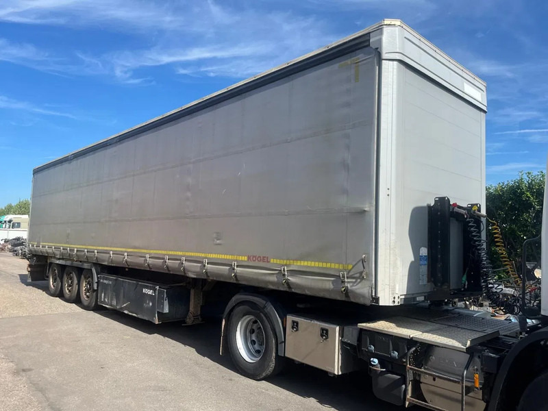 Kögel Schuifzeilen BPW assen - סמיטריילר עם וילונות צד: תמונה 1 Kögel Schuifzeilen BPW assen - סמיטריילר עם וילונות צד: תמונה 1