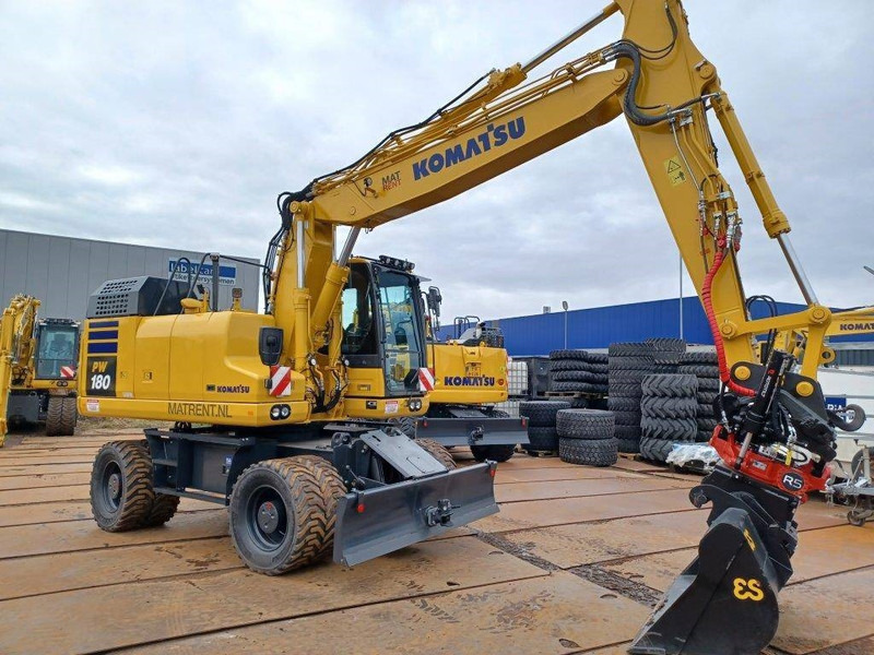 Komatsu PW180-11E0 - מחפר גלגלים: תמונה 1 Komatsu PW180-11E0 - מחפר גלגלים: תמונה 1